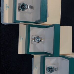 Rolex Silver and Black Timepiece